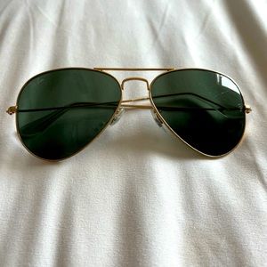 Ray Ban gold aviator sunglasses.